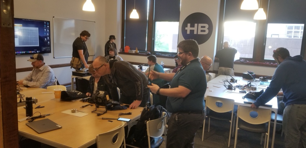 Fellowship of the Flux event booth